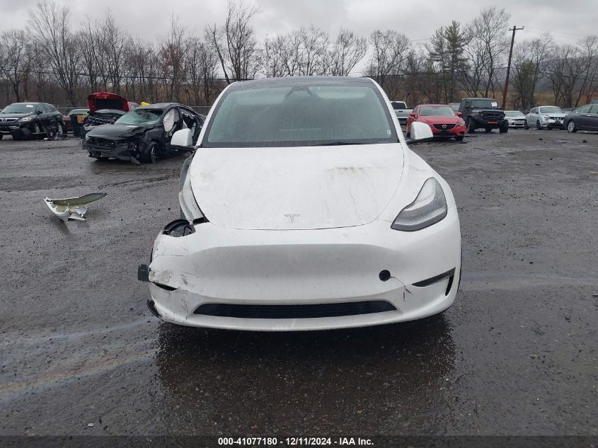 2023 Tesla Model Y Awd/Long Range Dual Motor All-Wheel Drive VIN: 7SAYGDEE0PA144654 Lot: 41077180