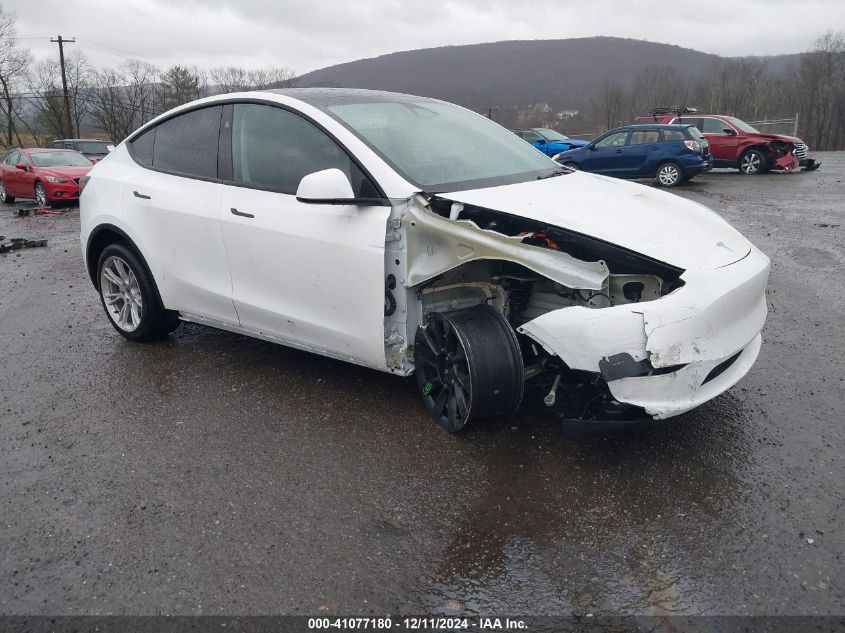 VIN 7SAYGDEE0PA144654 2023 Tesla Model Y, Awd/Long... no.1