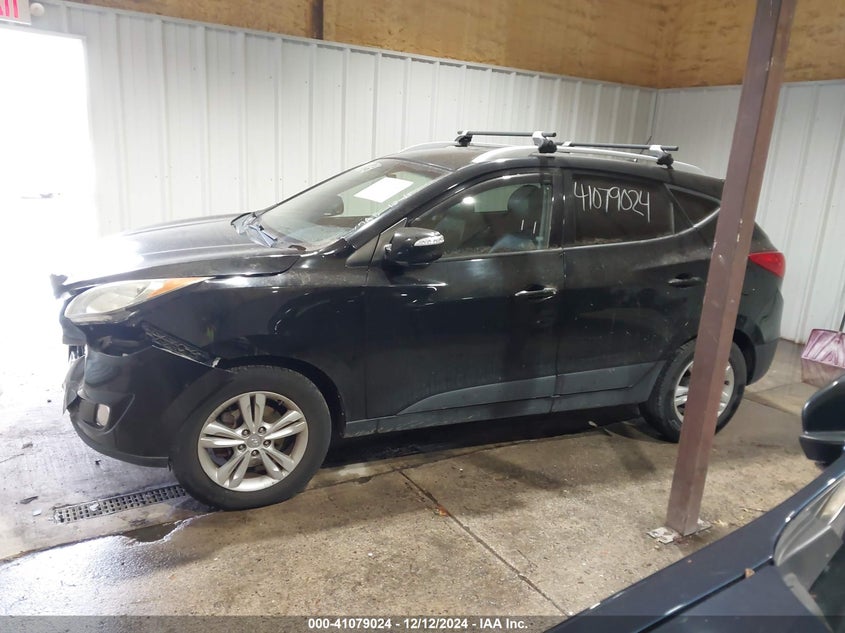 2013 HYUNDAI TUCSON VIN: KM8JUCAC0DU738670