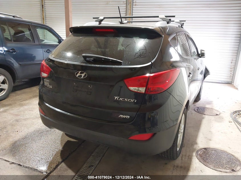 2013 HYUNDAI TUCSON VIN: KM8JUCAC0DU738670