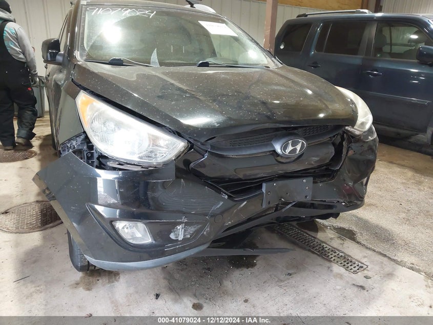 2013 HYUNDAI TUCSON VIN: KM8JUCAC0DU738670