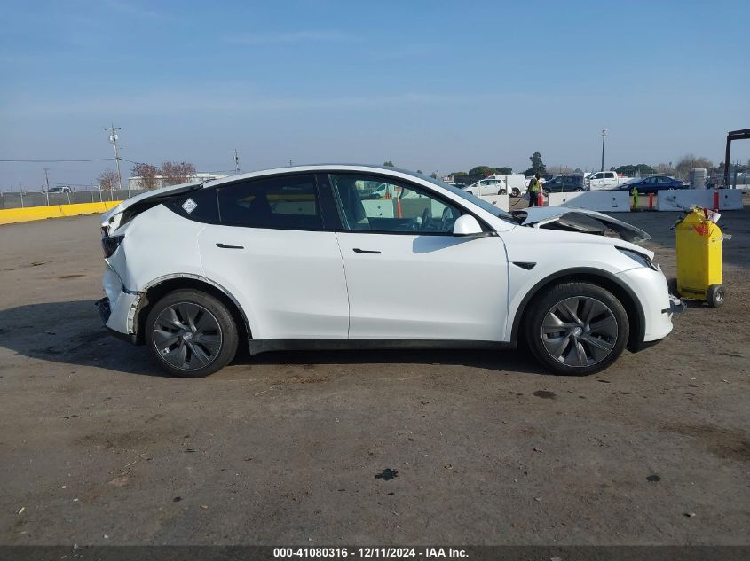 2023 Tesla Model Y Awd/Long Range Dual Motor All-Wheel Drive VIN: 7SAYGDEE3PF746354 Lot: 41080316