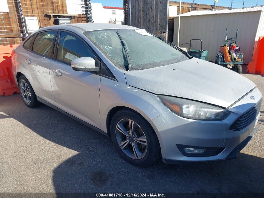 VIN 1FADP3FE9HL276422 2017 FORD FOCUS no.1