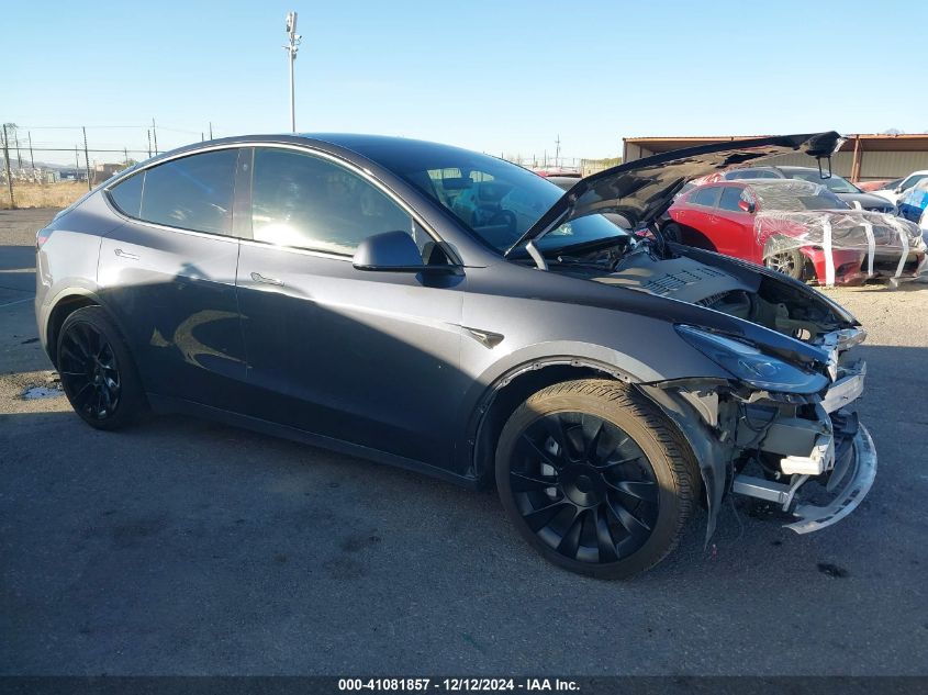 2023 Tesla Model Y Awd/Long Range Dual Motor All-Wheel Drive VIN: 7SAYGAEE7PF715171 Lot: 41081857