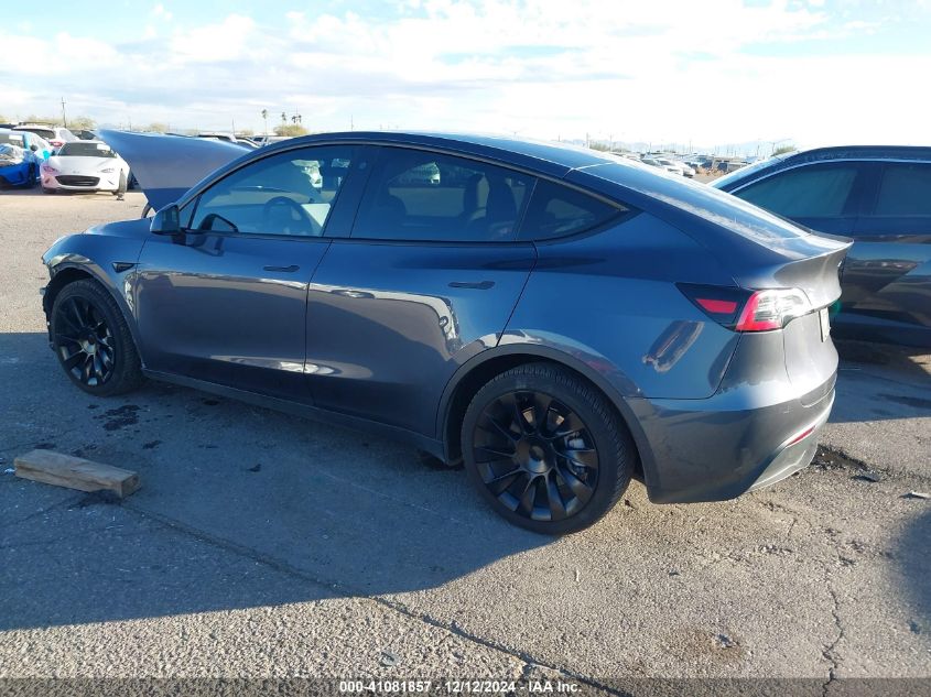 2023 Tesla Model Y Awd/Long Range Dual Motor All-Wheel Drive VIN: 7SAYGAEE7PF715171 Lot: 41081857