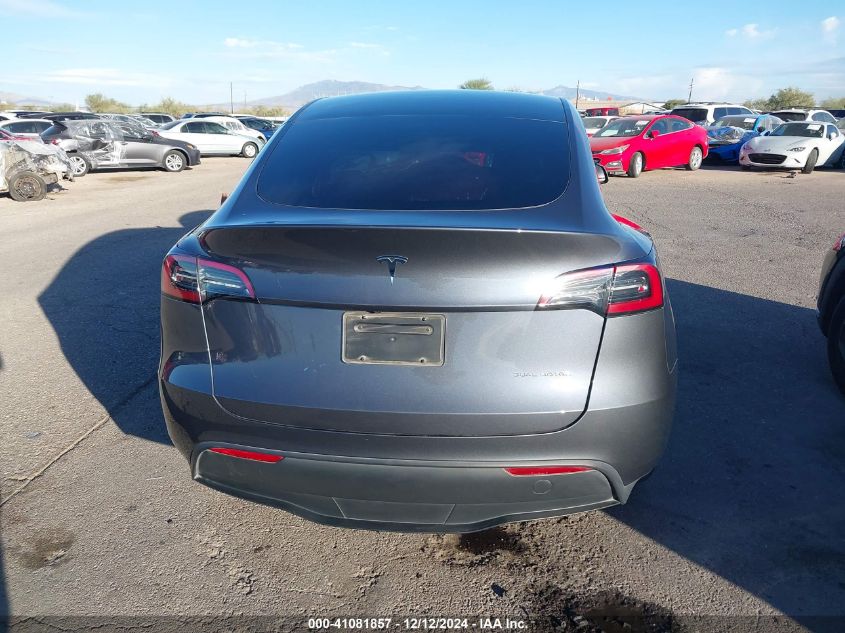 2023 Tesla Model Y Awd/Long Range Dual Motor All-Wheel Drive VIN: 7SAYGAEE7PF715171 Lot: 41081857