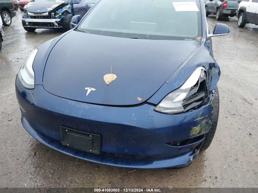 2018 Tesla Model 3 Long Range/Mid Range VIN: 5YJ3E1EA4JF038565 Lot: 41083003