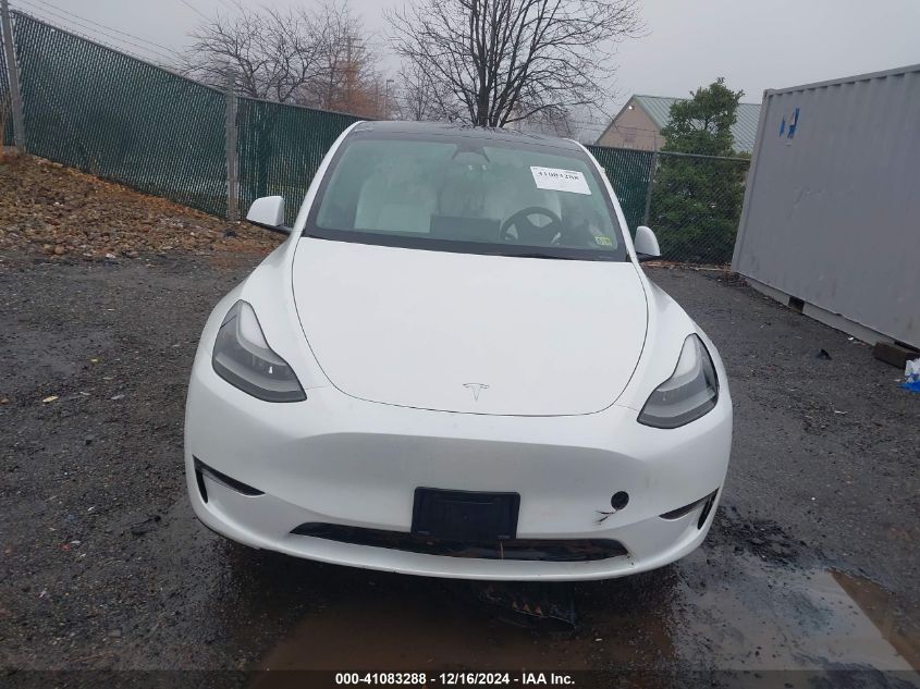 2023 Tesla Model Y VIN: 7SAYGDEE2PF701227 Lot: 41083288