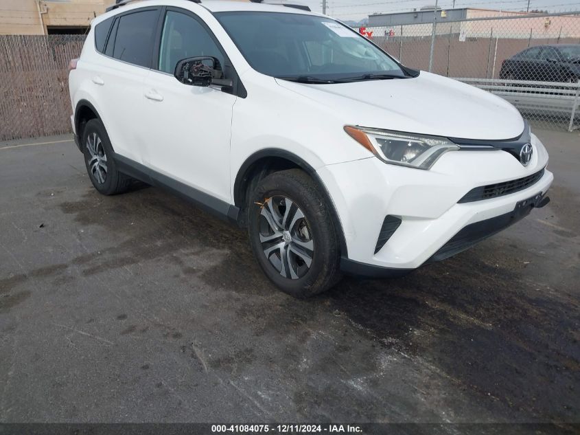 VIN 2T3ZFREV1GW244390 2016 Toyota RAV4, LE no.1