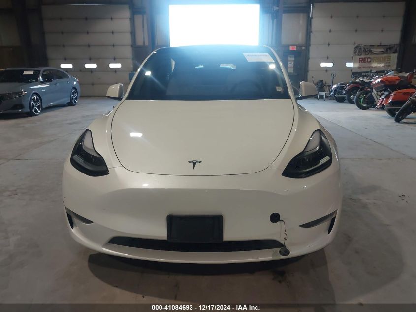 2023 Tesla Model Y Awd/Long Range Dual Motor All-Wheel Drive VIN: 7SAYGDEEXPF921229 Lot: 41084693