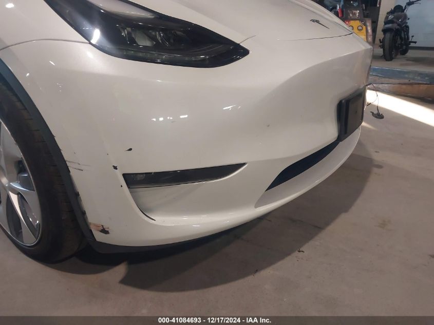 2023 Tesla Model Y Awd/Long Range Dual Motor All-Wheel Drive VIN: 7SAYGDEEXPF921229 Lot: 41084693