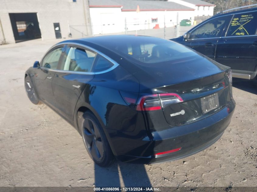 2018 Tesla Model 3 VIN: 5YJ3E1EB7JF128057 Lot: 41086096