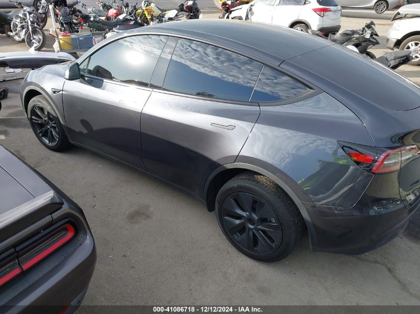 2025 Tesla Model Y Long Range Dual Motor All-Wheel Drive VIN: 7SAYGDED6SF229498 Lot: 41086718