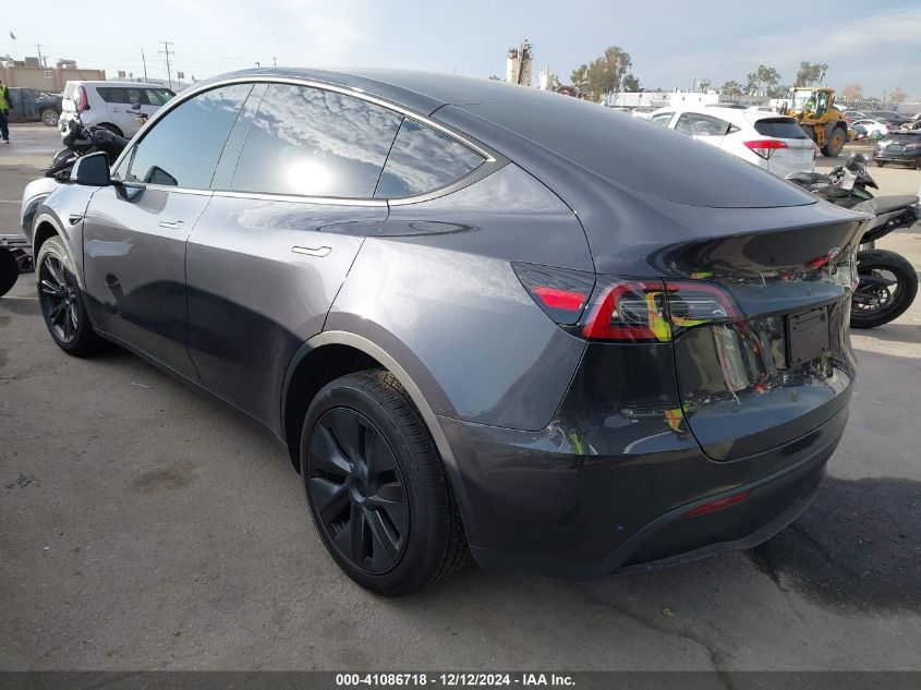 2025 Tesla Model Y Long Range Dual Motor All-Wheel Drive VIN: 7SAYGDED6SF229498 Lot: 41086718