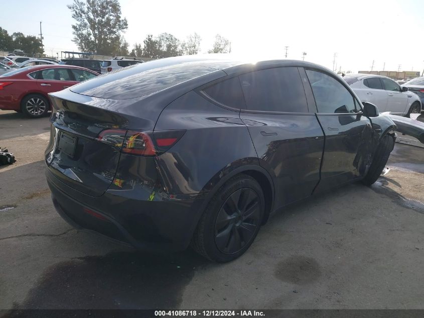 2025 Tesla Model Y Long Range Dual Motor All-Wheel Drive VIN: 7SAYGDED6SF229498 Lot: 41086718