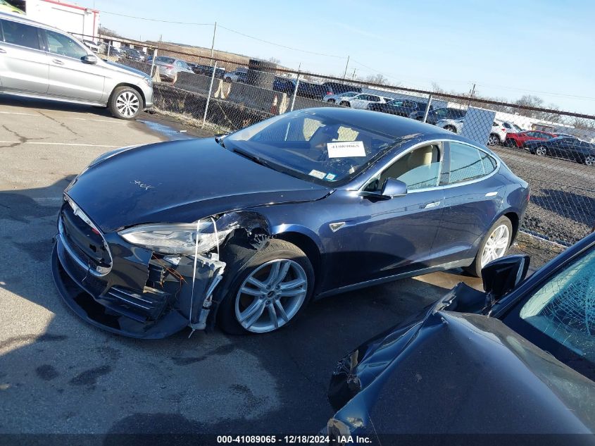 2014 Tesla Model S P85 VIN: 5YJSA1H14EFP37557 Lot: 41089065