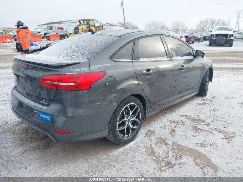 VIN 1FADP3F20FL340589 2015 Ford Focus, SE no.4