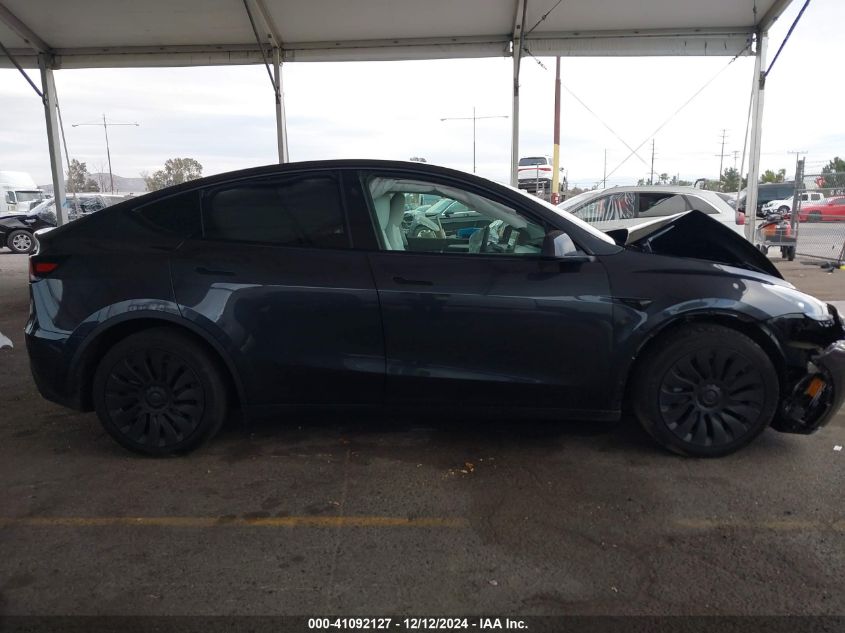 2025 Tesla Model Y Long Range Dual Motor All-Wheel Drive VIN: 7SAYGAEE5SF247580 Lot: 41092127