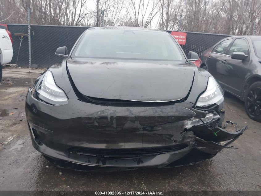 2018 Tesla Model 3 Long Range/Performance VIN: 5YJ3E1EBXJF127906 Lot: 41092395