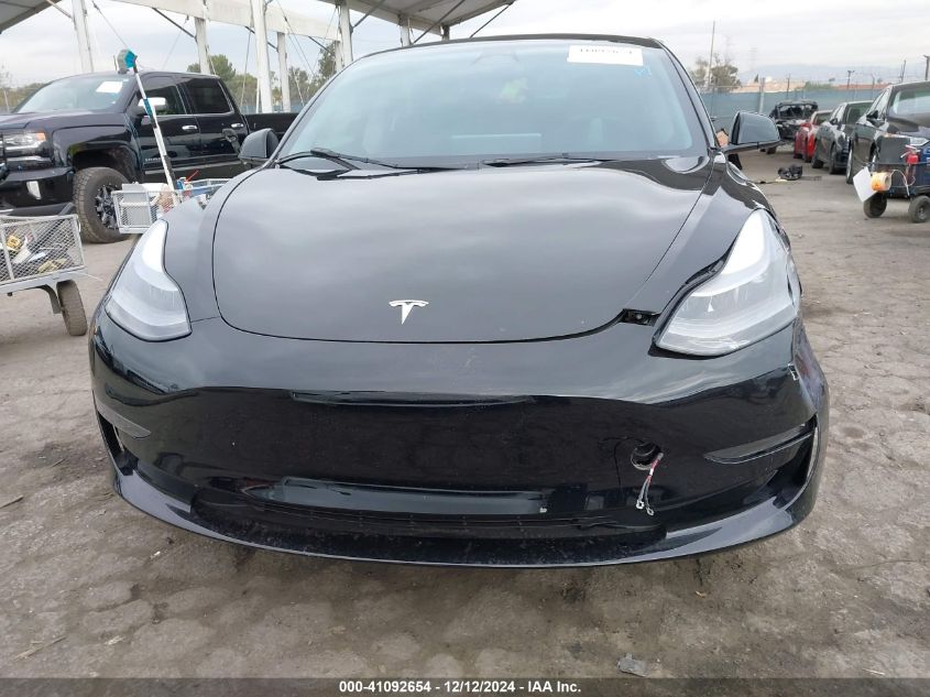 2023 Tesla Model 3 Rear-Wheel Drive VIN: 5YJ3E1EA9PF393899 Lot: 41092654