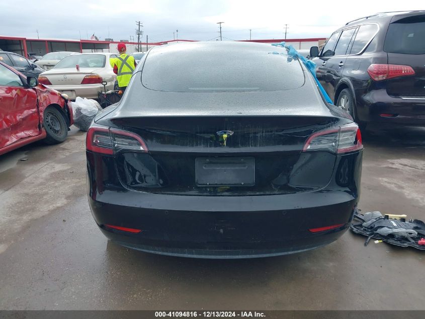 2021 Tesla Model 3 Standard Range Plus Rear-Wheel Drive VIN: 5YJ3E1EA9MF973374 Lot: 41094816