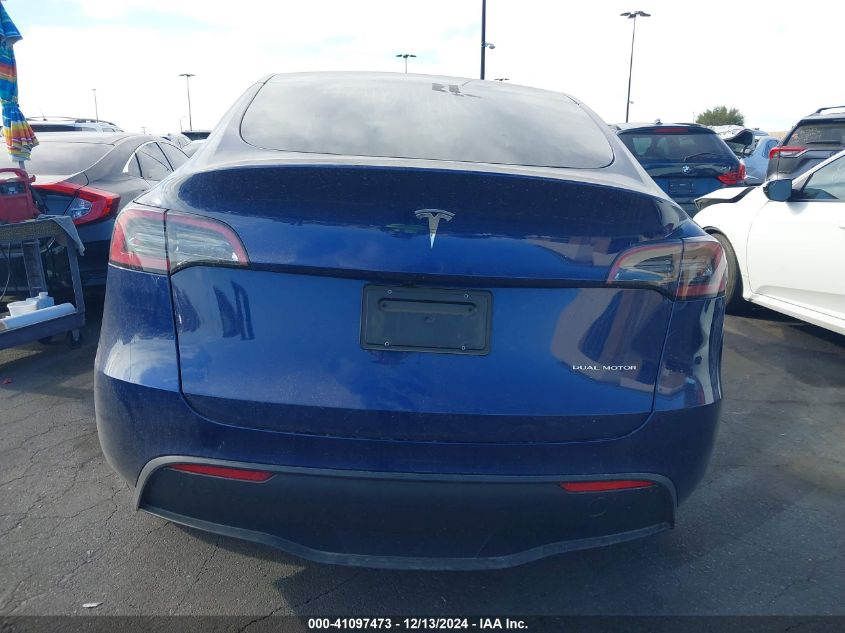 2023 Tesla Model Y Awd/Long Range Dual Motor All-Wheel Drive VIN: 7SAYGAEE6PF892570 Lot: 41097473