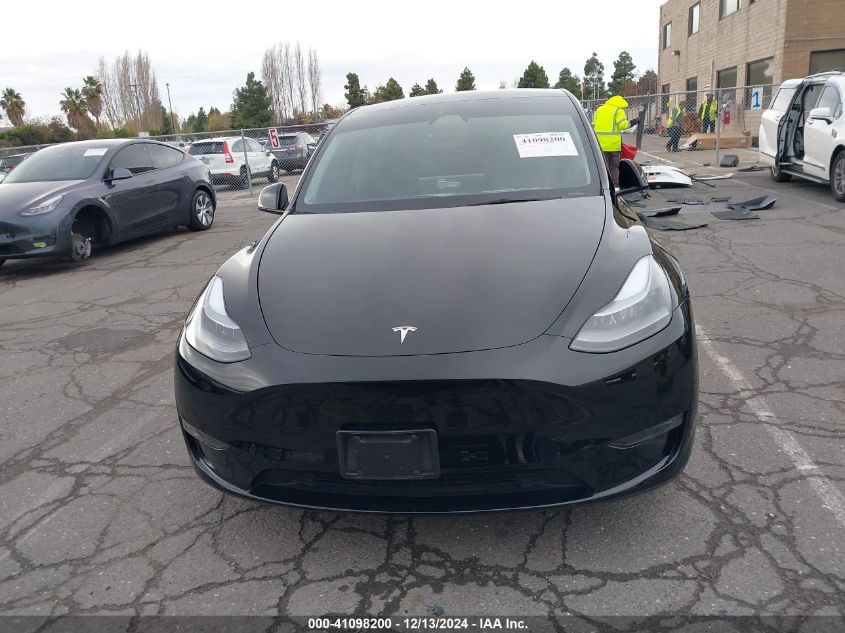 2024 Tesla Model Y Long Range Dual Motor All-Wheel Drive VIN: 7SAYGDEEXRF983040 Lot: 41098200