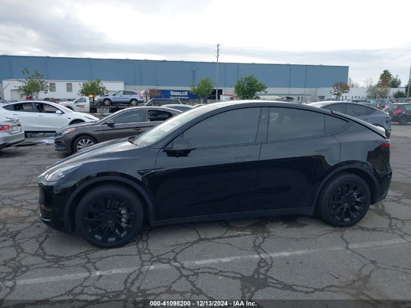 2024 Tesla Model Y Long Range Dual Motor All-Wheel Drive VIN: 7SAYGDEEXRF983040 Lot: 41098200