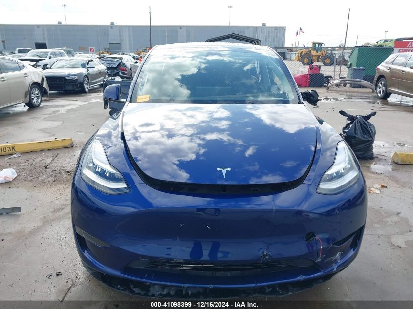 2023 Tesla Model Y VIN: 7SAYGDEEXPA091039 Lot: 41098399