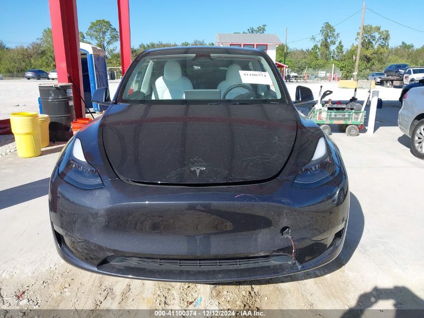 2024 Tesla Model Y Long Range Dual Motor All-Wheel Drive VIN: 7SAYGDEE2RA248100 Lot: 41100374