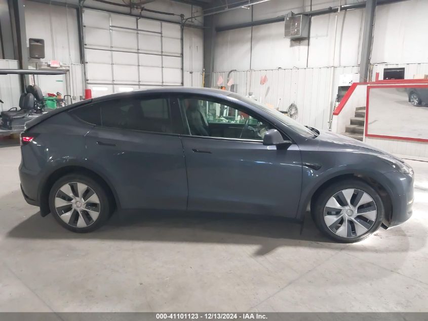 2023 Tesla Model Y Awd/Long Range Dual Motor All-Wheel Drive VIN: 7SAYGDEE3PF715864 Lot: 41101123