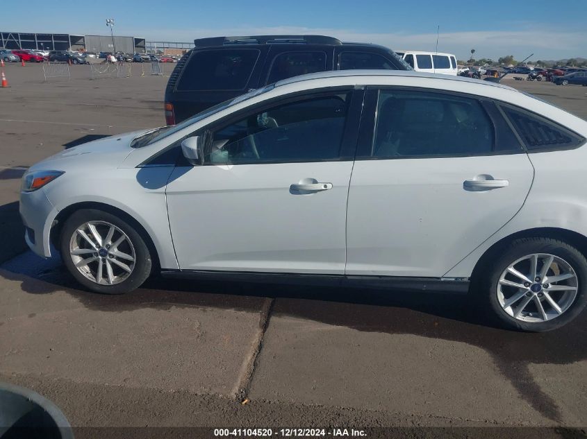 VIN 1FADP3F20JL295498 2018 Ford Focus, SE no.14