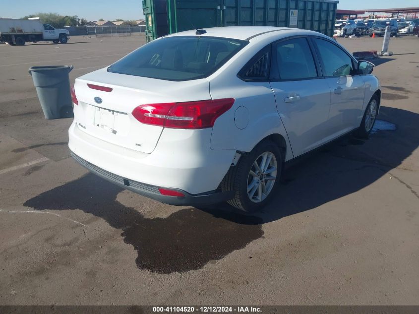 VIN 1FADP3F20JL295498 2018 Ford Focus, SE no.4