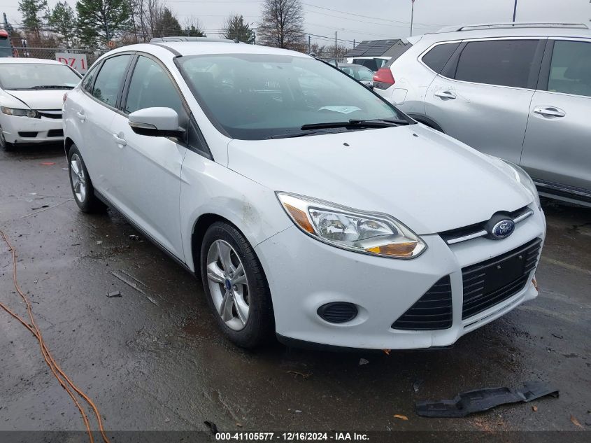 VIN 1FADP3F21EL107075 2014 FORD FOCUS no.1