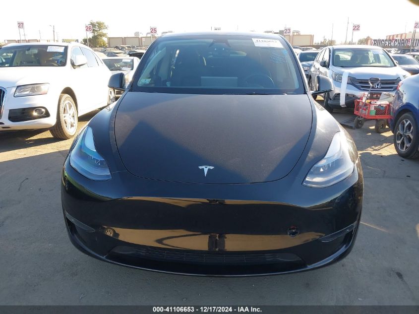 2024 Tesla Model Y Long Range Dual Motor All-Wheel Drive VIN: 7SAYGDEEXRA216186 Lot: 41106653