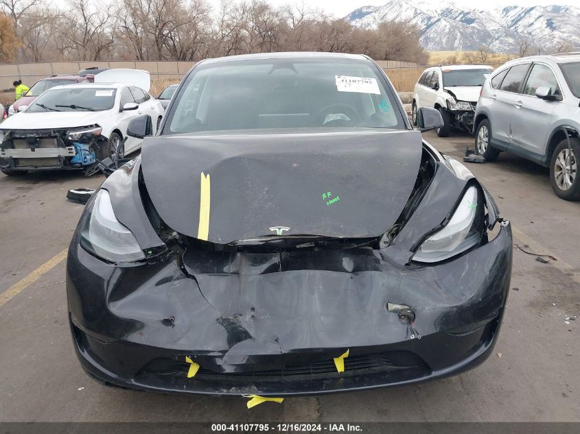 2024 Tesla Model Y Long Range Dual Motor All-Wheel Drive VIN: 7SAYGAEE8RF210386 Lot: 41107795