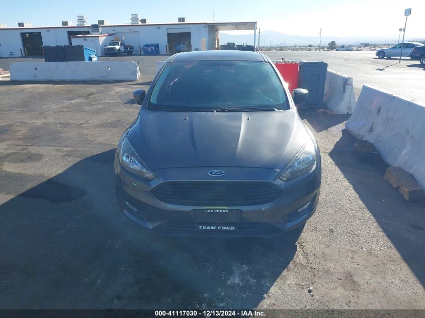 VIN 1FADP3FE7JL313120 2018 Ford Focus, SE no.12