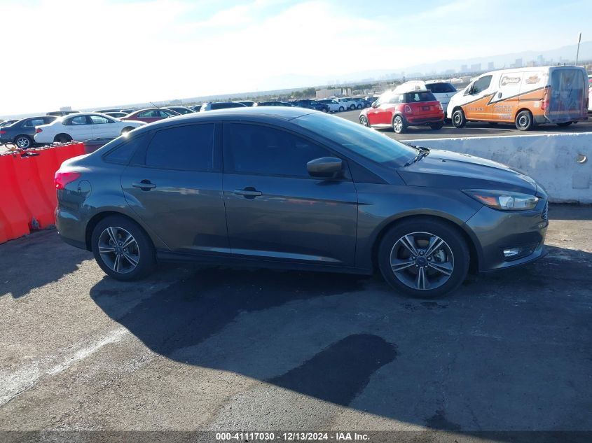 VIN 1FADP3FE7JL313120 2018 Ford Focus, SE no.13