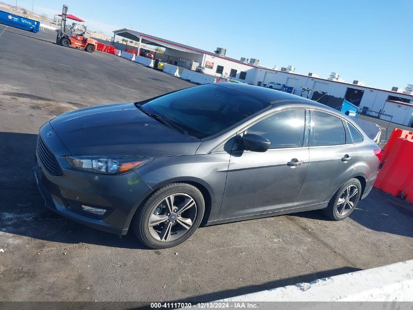 VIN 1FADP3FE7JL313120 2018 Ford Focus, SE no.14