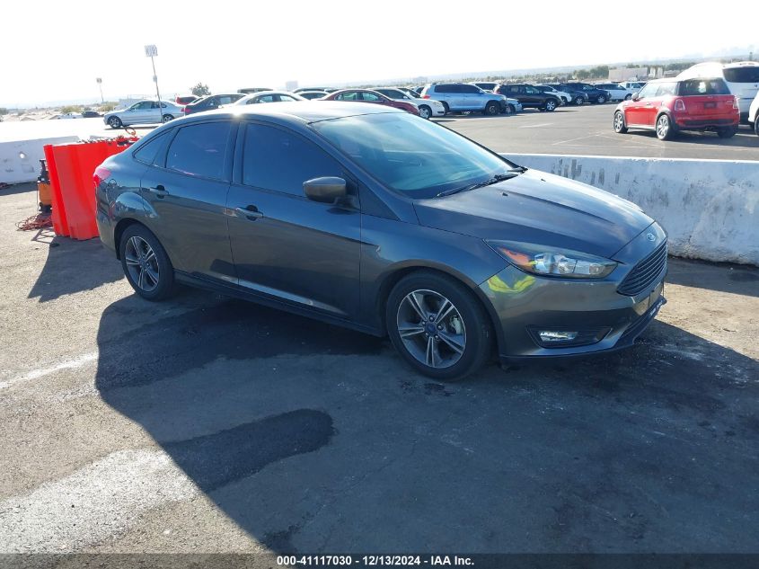 VIN 1FADP3FE7JL313120 2018 Ford Focus, SE no.1