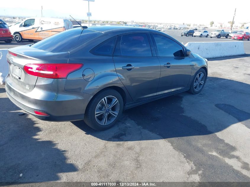 VIN 1FADP3FE7JL313120 2018 Ford Focus, SE no.4