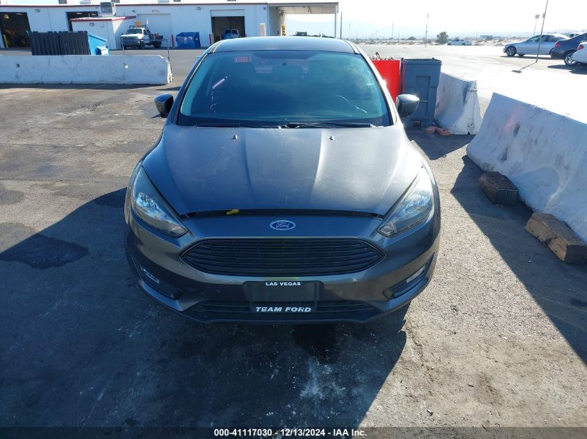 VIN 1FADP3FE7JL313120 2018 Ford Focus, SE no.6