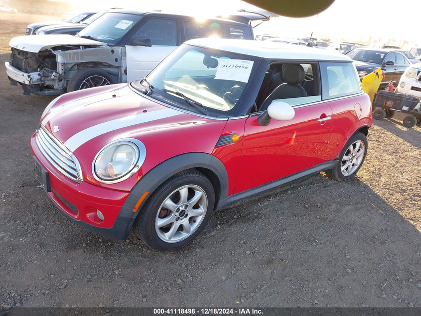 2007 MINI COOPER VIN: WMWMF33557TT57821