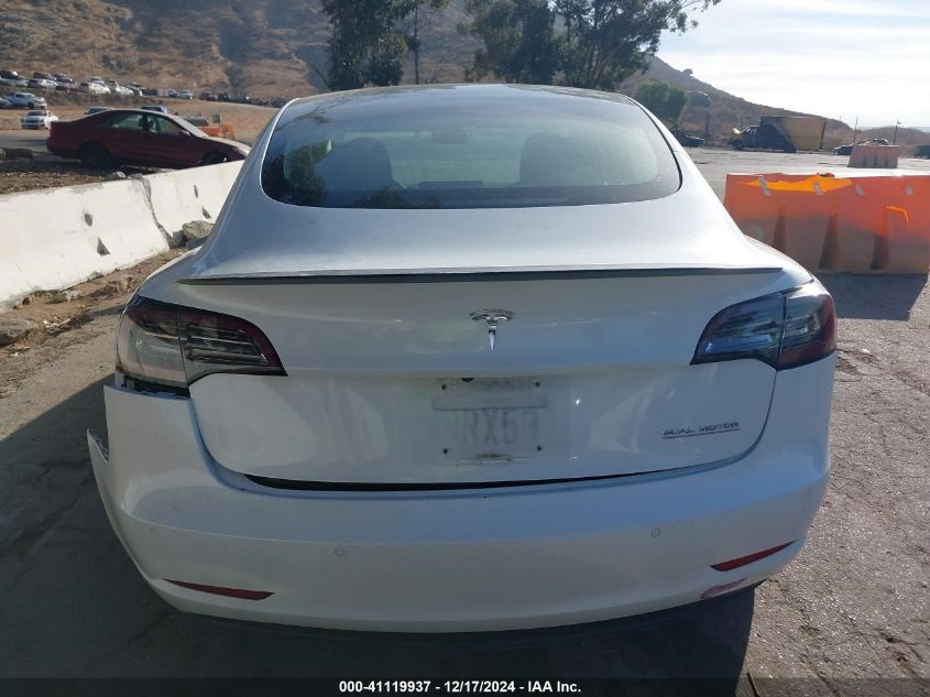 2018 Tesla Model 3 Long Range/Performance VIN: 5YJ3E1EB5JF084379 Lot: 41119937