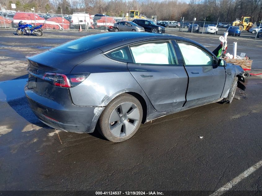 2021 Tesla Model 3 Standard Range Plus Rear-Wheel Drive VIN: 5YJ3E1EA5MF977051 Lot: 41124537