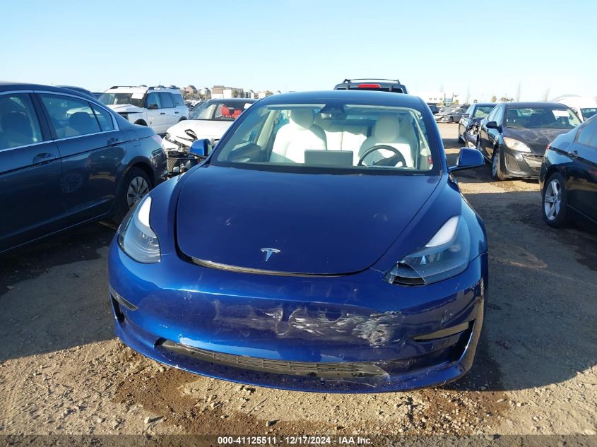 2022 Tesla Model 3 Long Range Dual Motor All-Wheel Drive VIN: 5YJ3E1EB5NF204705 Lot: 41125511