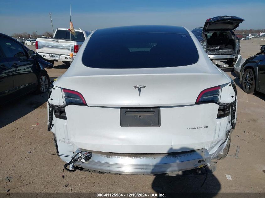 2023 Tesla Model Y Awd/Long Range Dual Motor All-Wheel Drive VIN: 7SAYGAEEXPF598086 Lot: 41125984