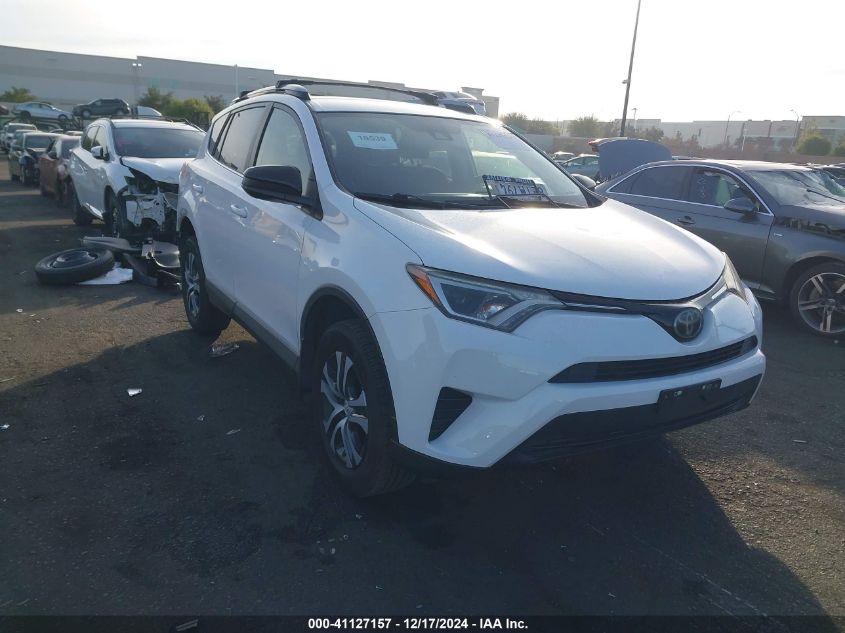 VIN JTMZFREVXJJ196751 2018 Toyota RAV4, LE no.14