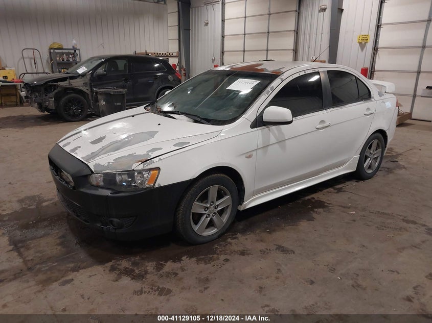 2009 MITSUBISHI LANCER VIN: JA3AU26UX9U006603