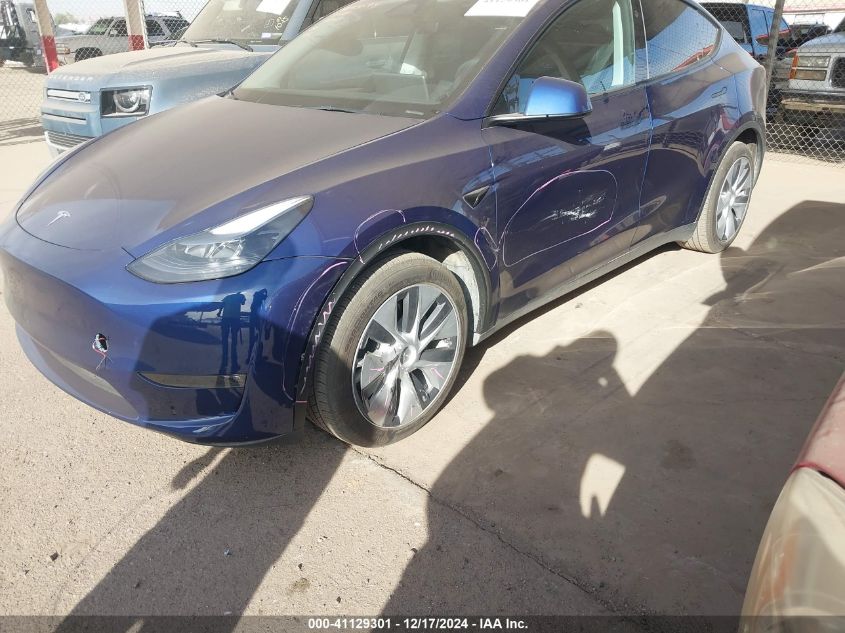 2023 Tesla Model Y VIN: 7SAYGDEE7PF908423 Lot: 41129301